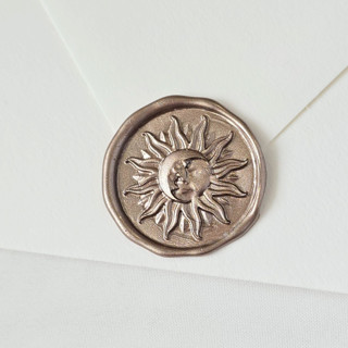 This is a multicolor wax seals by Inkspiringletters called sun and moon- customizable color- set of 25 hand-crafted wax seals in standard