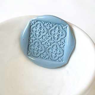 This is a multicolorassorted-colors wax seals by Abby Choi called tuscan tile wax seal, pack of 10, customizable color in standard