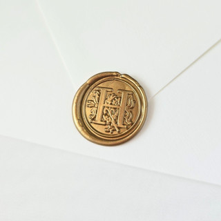 This is a multicolor wax seals by Inkspiringletters called antique monogram (a-z)- customizable color- set of 25 hand-crafted wax seals in standard