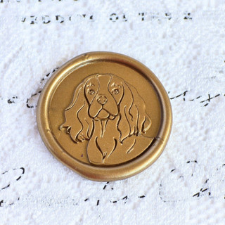 This is a multicolor wax seals by Inkspiringletters called cocker spaniel- customizable color- set of 25 hand-crafted wax seals in standard