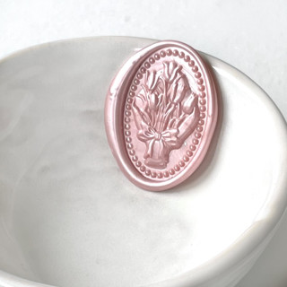 This is a multicolorassorted-colors wax seals by Abby Choi called tulip bouquet wax seal pack of 10, customizable color in standard