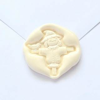 This is a multicolor wax seals by Inkspiringletters called scarecrow- customizable color- set of 25 hand-crafted wax seals in standard