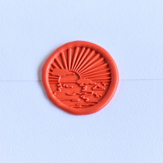 This is a multicolor wax seals by Inkspiringletters called sunset- customizable color- set of 25 hand-crafted wax seals in standard