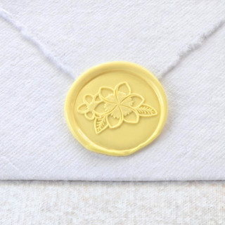 This is a multicolor wax seals by Inkspiringletters called plumeria- customizable color- set of 25 hand-crafted wax seals in standard