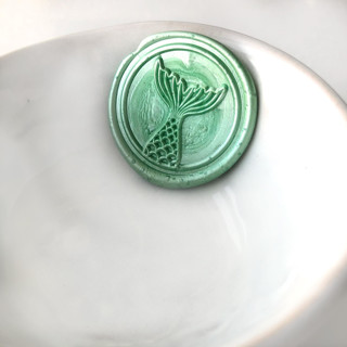 This is a multicolorassorted-colors wax seals by Abby Choi called mermaid tail wax seal  pack of 10, customizable color in standard