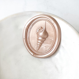 This is a multicolorassorted-colors wax seals by Abby Choi called spindal shell wax seal, pack of 10, customizable color in standard