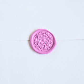 This is a multicolor wax seals by Inkspiringletters called happy easter egg- customizable color- set of 25 hand-crafted wax seals in standard