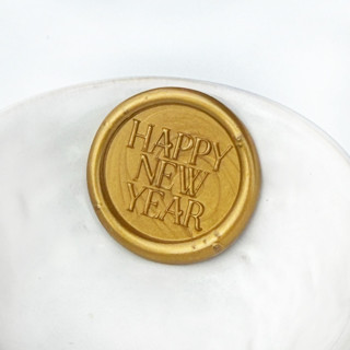 This is a multicolorassorted-colors wax seals by Abby Choi called happy new year wax seal, pack of 10, customizable color in standard