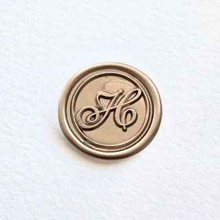 This is a multicolor wax seals by Inkspiringletters called traditional script monogram- customizable color- set of 25 hand-crafted wax seals in standard