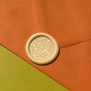 This is a multicolorassorted-colors wax seals by Eva Tadros called flower power wax seal sticker - pack of 10 in standard
