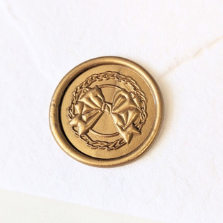 This is a gold wax seals by Inkspiringletters called wreath - customizable color- set of 25  hand-crafted wax seals in standard