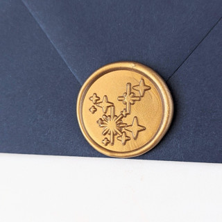 This is a multicolor wax seals by Inkspiringletters called stardust- customizable color- set of 25 hand-crafted wax seals in standard