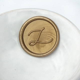 This is a multicolorassorted-colors wax seals by Abby Choi called handwritten script initial wax seal  pack of 10, customizable color in standard