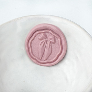 This is a multicolorassorted-colors wax seals by Abby Choi called fancy bow wax seal pack of 10, customizable in standard