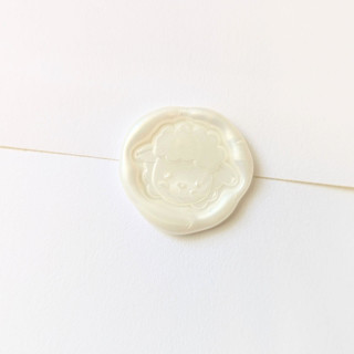 This is a multicolor wax seals by Inkspiringletters called lamb- customizable color- set of 25 hand-crafted wax seals in standard