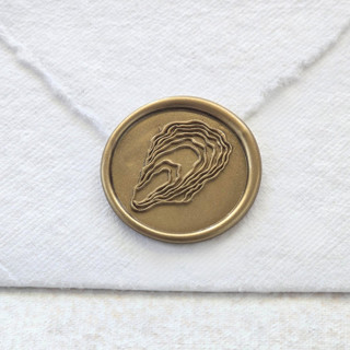 This is a multicolor wax seals by Inkspiringletters called oyster- customizable color- set of 25 hand-crafted wax seals in standard