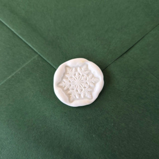 This is a multicolor wax seals by Inkspiringletters called let it snow- customizable color- set of 25 hand-crafted wax seals in standard