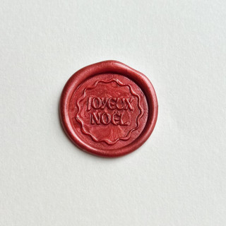This is a multicolorassorted-colors wax seals by Eva Tadros called joyeux noel wax seal stickers- pack of 10 in standard
