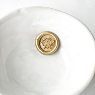 This is a multicolorassorted-colors wax seals by Abby Choi called bumble bee seals, pack of 10, customizable color in standard