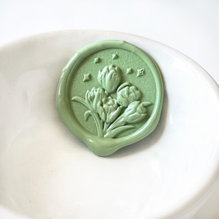 This is a multicolorassorted-colors wax seals by Abby Choi called 3d tulips wax seal, pack of 10, customizable color in standard