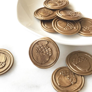 This is a multicolorassorted-colors wax seals by Abby Choi called acorn wax seal pack of 10, customizable in standard