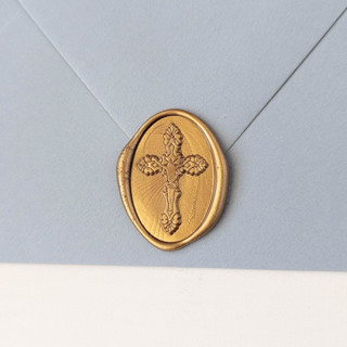 This is a multicolor wax seals by Inkspiringletters called cross- customizable color- set of 25 hand-crafted wax seals in standard