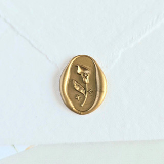 This is a multicolor wax seals by Inkspiringletters called calla lily- customizable color- set of 25 hand-crafted wax seals in standard