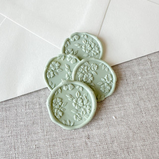 This is a green wax seals by Orchid Studio called sage green floral pattern 3d wax seal stickers | set of 10 in standard