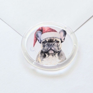 This is a clear wax seals by Inkspiringletters called watercolor santa dogs- customizable by breed- set of 25 hand-crafted clear wax seals in standard