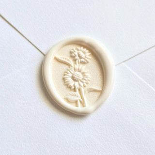 This is a multicolor wax seals by Inkspiringletters called sunflower- customizable color- set of 25 hand-crafted wax seals in standard