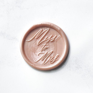 This is a pink wax seals by Abby Choi called miss to mrs in champagne pack of 10 in standard