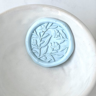 This is a multicolorassorted-colors wax seals by Abby Choi called flower vine wax seal, pack of 10, customizable color in standard