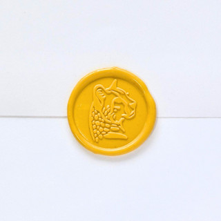 This is a multicolor wax seals by Inkspiringletters called cheetah- customizable color- set of 25  hand- crafted wax seals in standard