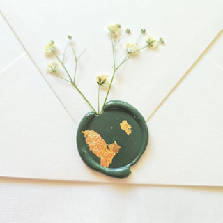 This is a multicolor wax seals by Inkspiringletters called baby's breath- customizable wax color- set of 25 hand-crafted wax seals with pressed florals and gold leaf accents in standard