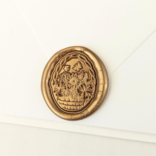 This is a multicolor wax seals by Inkspiringletters called spring basket- customizable color- set of 25 hand-crafted wax seals in standard