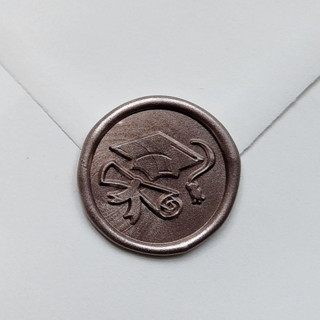 This is a multicolorassorted-colors wax seals by MC silverlinings called customizable color graduation cap and scroll self-adhesive wax seals, set of 5 in standard
