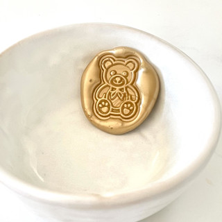 This is a multicolorassorted-colors wax seals by Abby Choi called teddy bear seals pack of 10, customizable color in standard