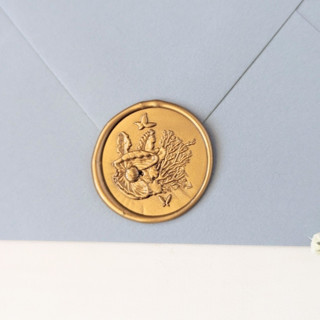 This is a multicolor wax seals by Inkspiringletters called under the sea- customizable color- set of 25 hand-crafted wax seals in standard