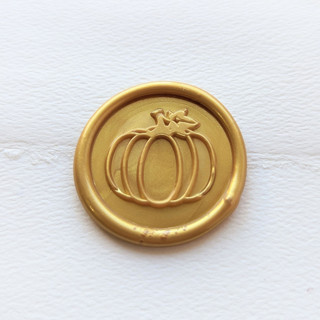 This is a multicolor wax seals by Inkspiringletters called pumpkin- customizable color- set of 25 hand-crafted wax seals in standard