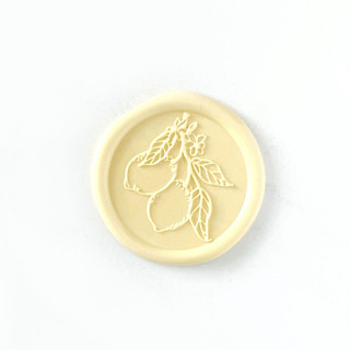 This is a yellow wax seals by Abby Choi called lemons wax seal in lemonade pack of 10 in standard