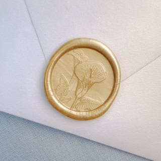 This is a gold wax seals by Sterling Stripes called calla lily wax seal (25 pack) - prosecco in standard