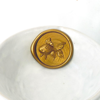This is a multicolorassorted-colors wax seals by Abby Choi called goldfish wax seal, pack of 10, customizable color in standard