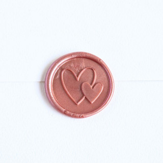 This is a multicolor wax seals by Inkspiringletters called two hearts- customizable color- set of 25 hand-crafted wax seals in standard