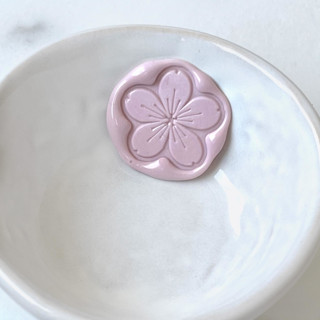This is a multicolorassorted-colors wax seals by Abby Choi called cherry blossom flower wax seal pack of 10, customizable in standard