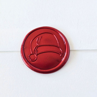 This is a multicolor wax seals by Inkspiringletters called santa is coming- customizable color- set of 25 hand-crafted wax seals in standard
