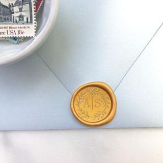 This is a multicolorassorted-colors wax seals by Abby Choi called wreath initial wax seals, pack of 10, customizable in standard