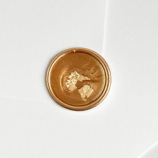 This is a gold wax seals by Self Stationery called wax seals with gold flakes | handmade adhesive wax stickers for invitations in standard