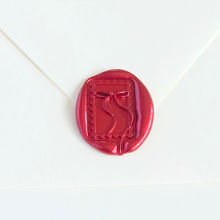 This is a multicolor wax seals by Inkspiringletters called bow postage- customizable color- hand-crafted wax seals- set of 25 in standard