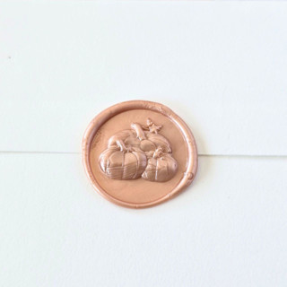 This is a multicolor wax seals by Inkspiringletters called pumpkin patch- customizable color- set of 25 hand-crafted wax seals in standard