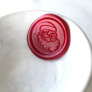 This is a multicolorassorted-colors wax seals by Abby Choi called santa claus wax seals, pack of 10, customizable color in standard